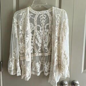 Beautiful embroidered lace cardigan with bell sleeves. Boho Chic! Size M